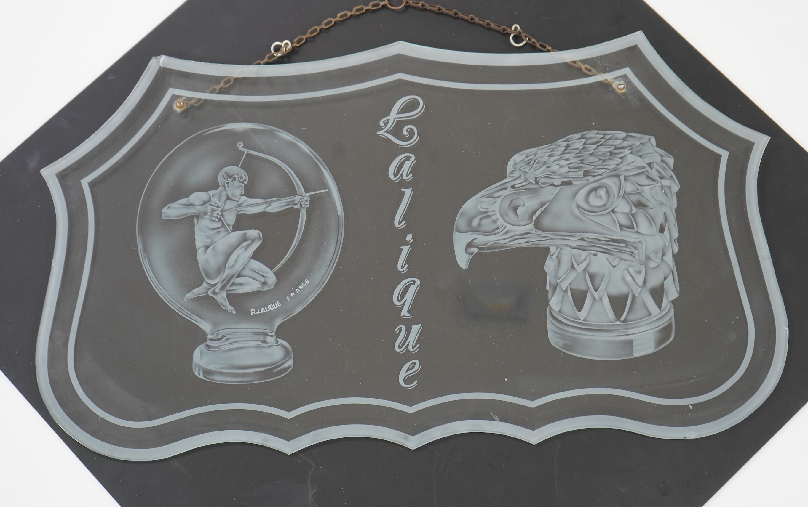 A rare boutique advertising hanging glass sign for Lalique